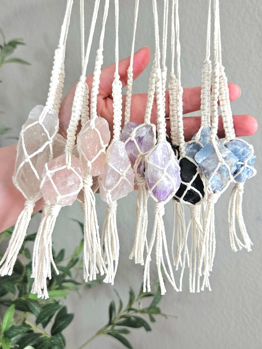 Macrame wrapped crystal rear view mirror charm.